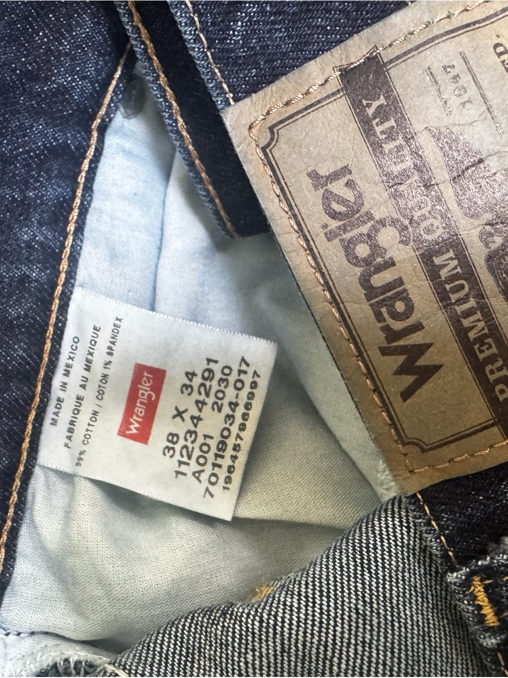 Wrangler Men's Indigo Blue Denim Jeans with Brown Leather Patch